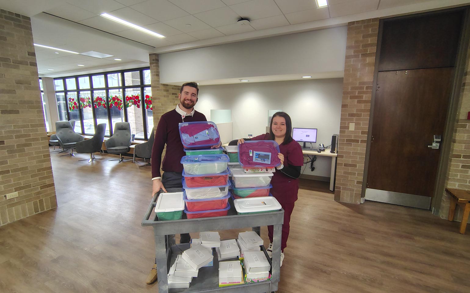 Two Nursing students hold up Healing Treasure Boxes.